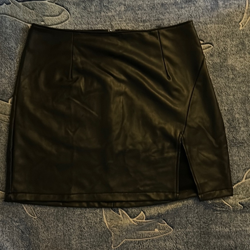 Rewash brand black leather skirt.